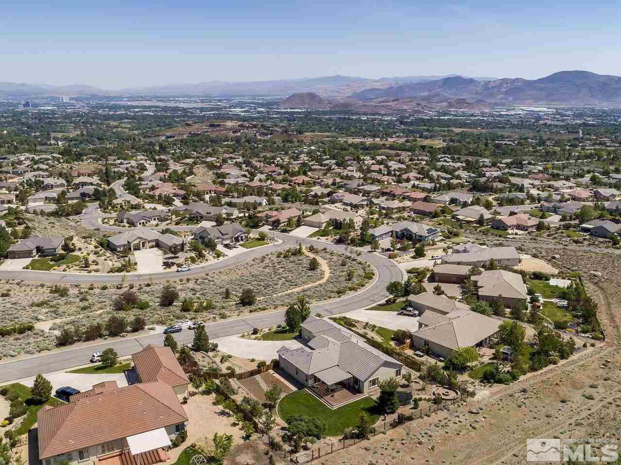 895 Peacepipe Loop Reno, NV 89511 - Photo 4 of 37 an aerial view of residential house and green space