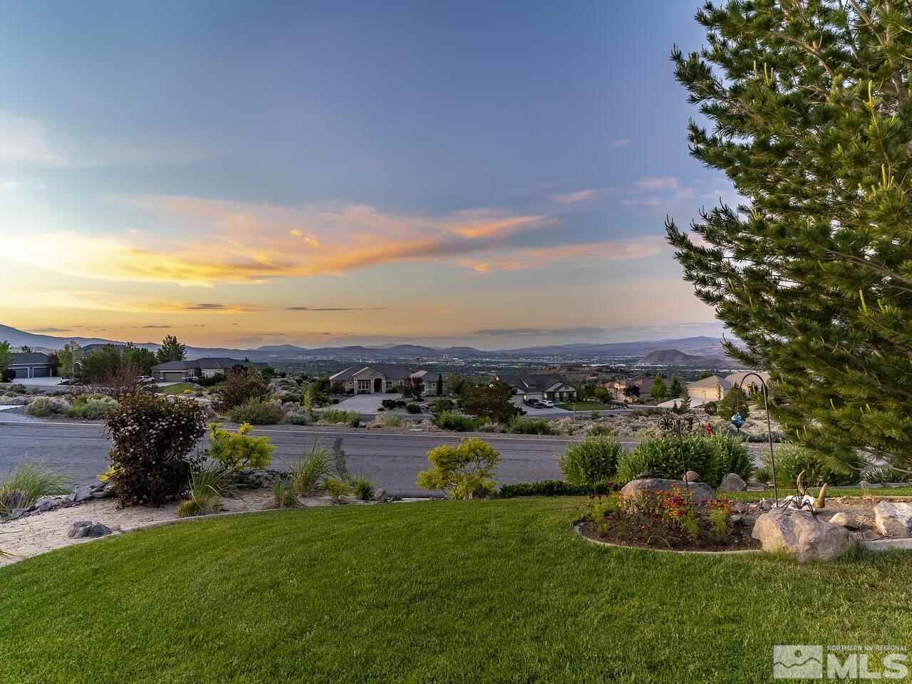 895 Peacepipe Loop Reno, NV 89511 - Photo 6 of 37 a view of a garden and lake view