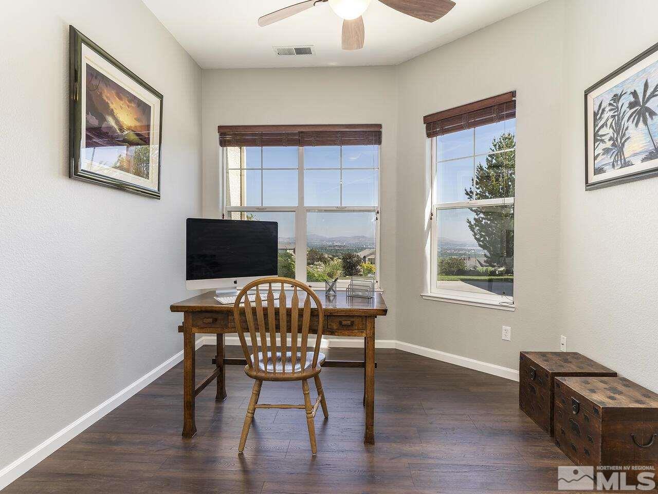 895 Peacepipe Loop Reno, NV 89511 - Photo 10 of 37 a workspace with furniture window and wooden floor
