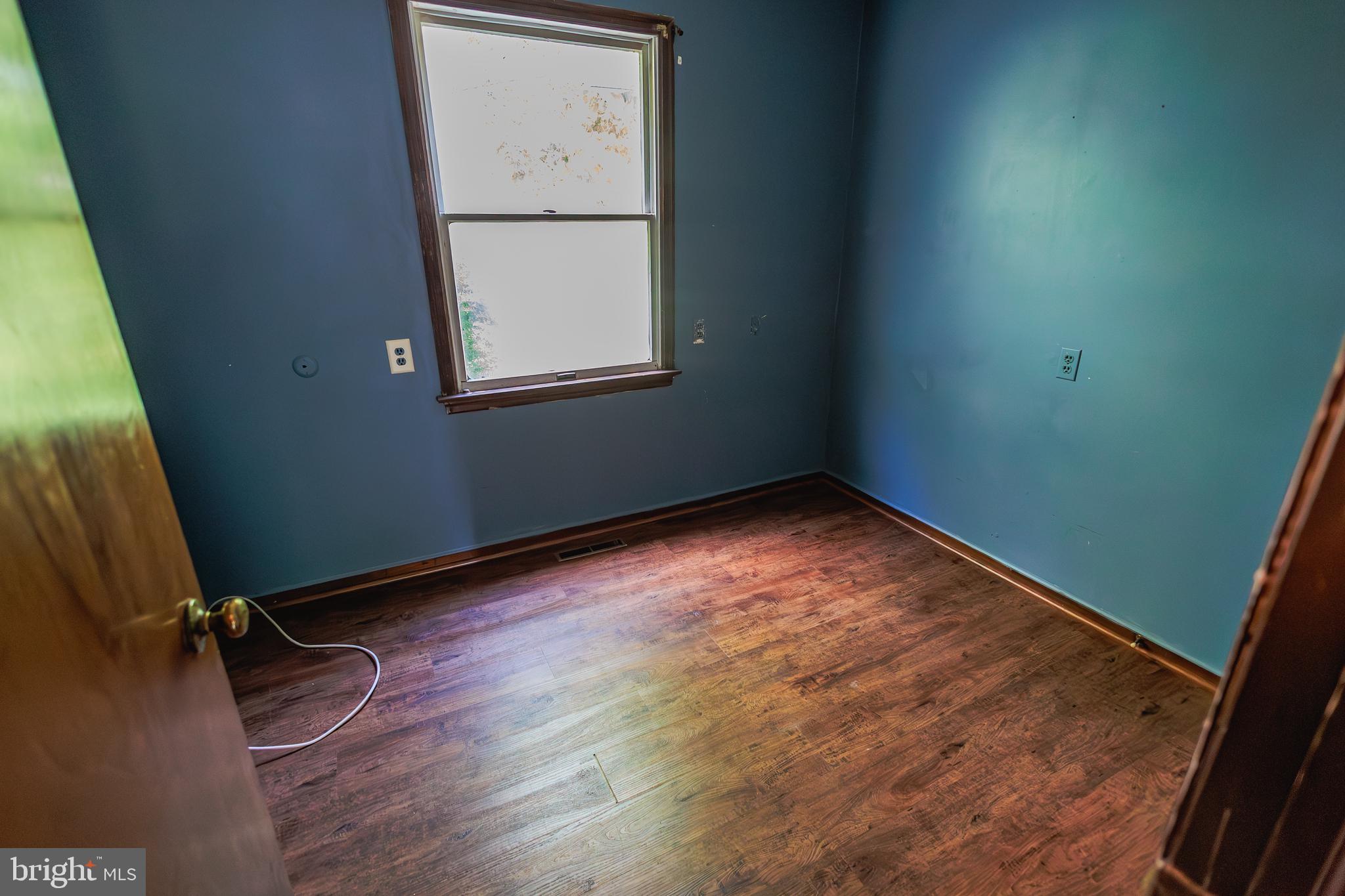 213 Laurel Avenue, Unit B Glassboro, NJ 08028 - Photo 15 of 24 an empty room with windows