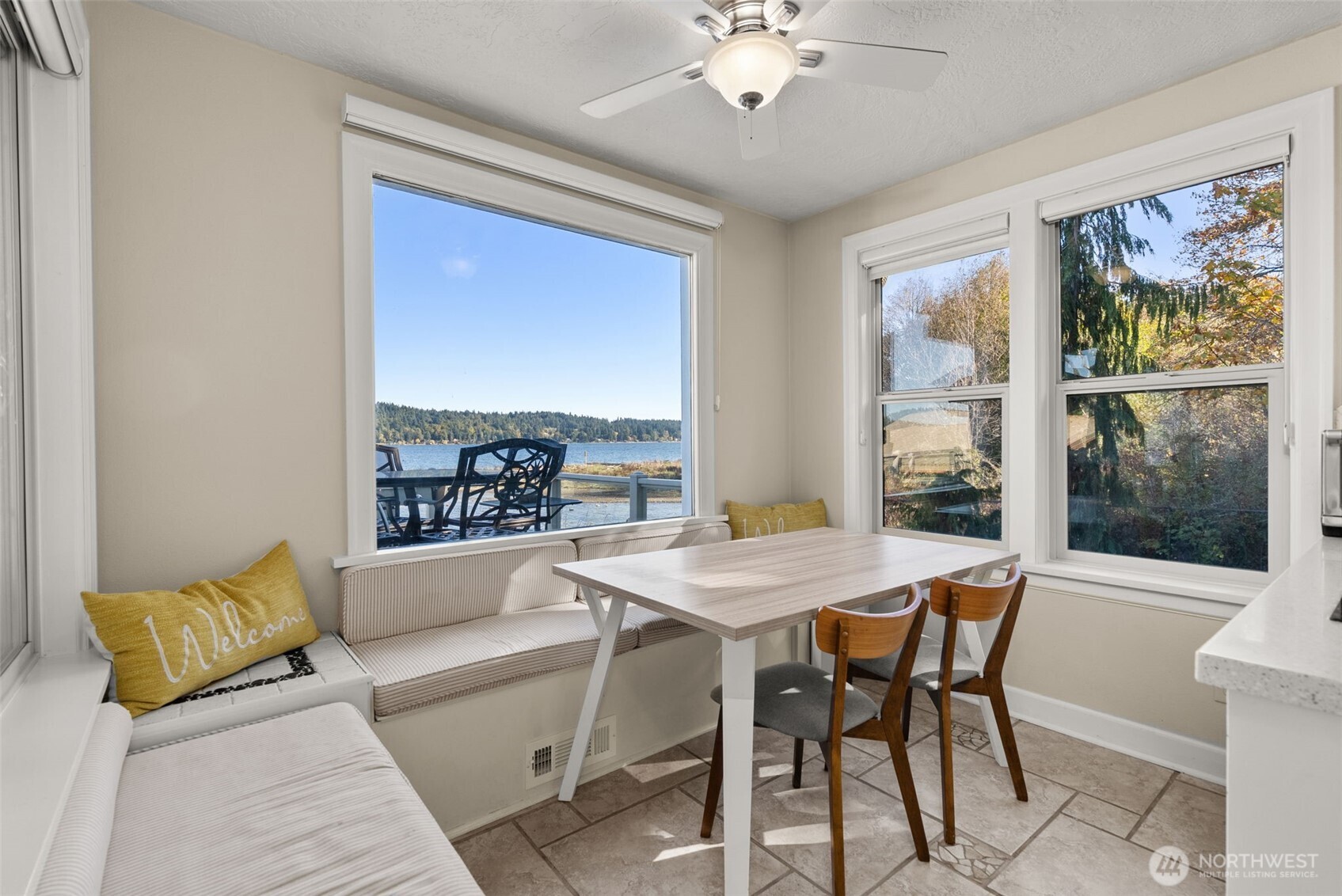 5208 Illahee Road Northeast Bremerton, WA 98311 - Photo 13 of 39 a living room with furniture and a large window
