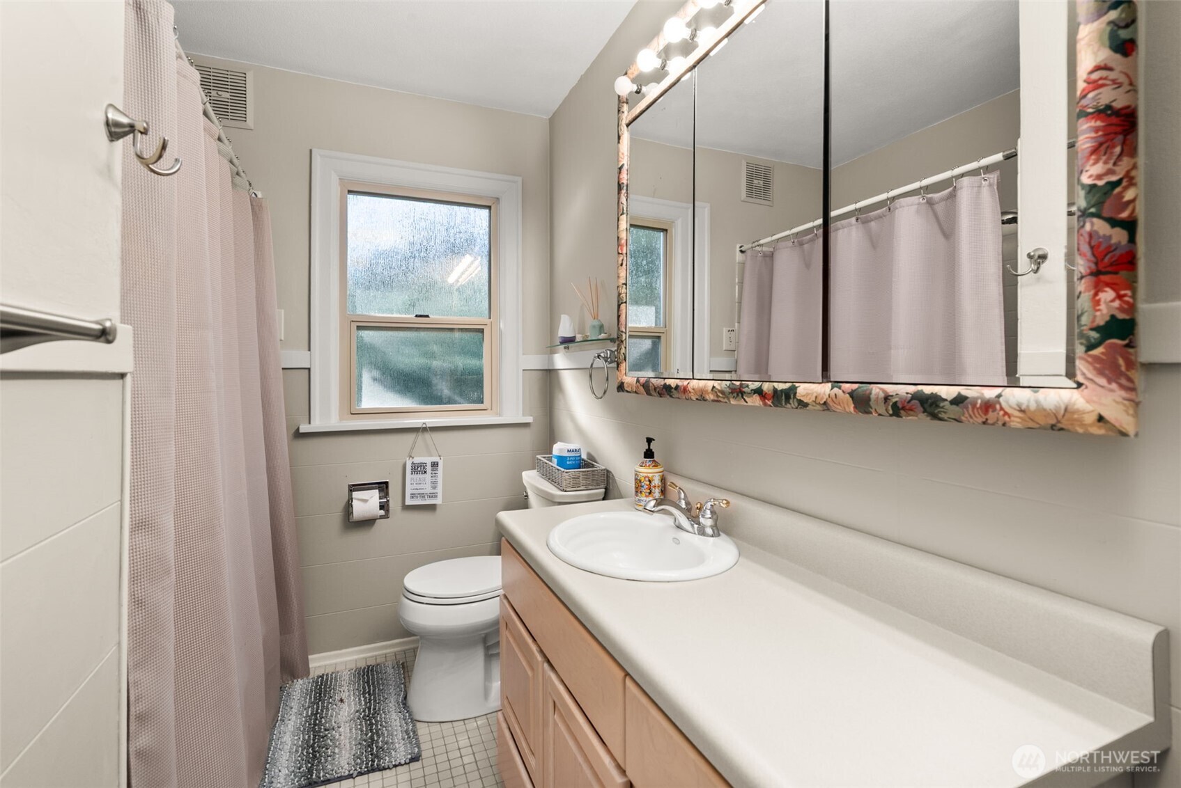5208 Illahee Road Northeast Bremerton, WA 98311 - Photo 20 of 39 a bathroom with a sink and a mirror