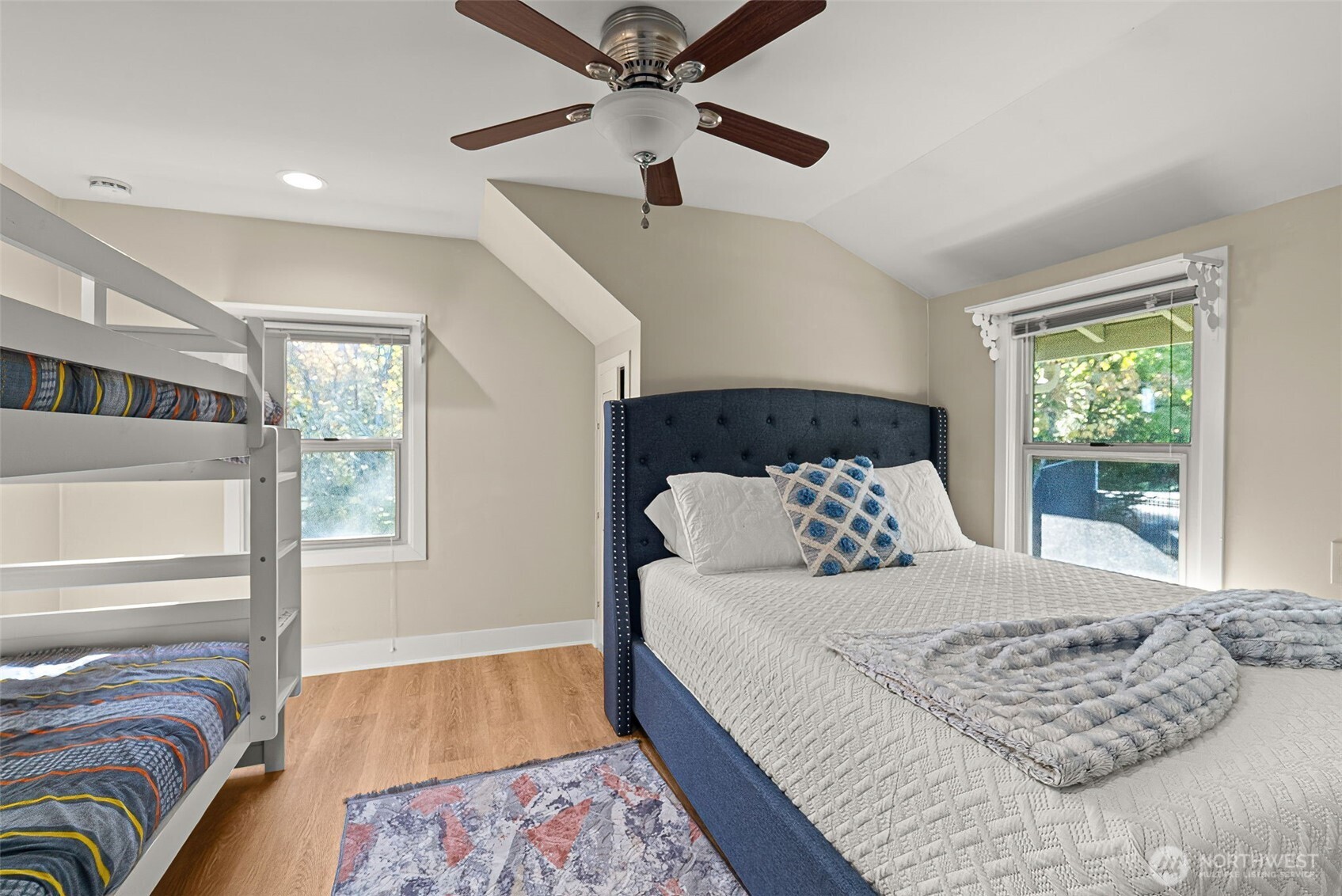 5208 Illahee Road Northeast Bremerton, WA 98311 - Photo 21 of 39 a bedroom with a large bed and a window