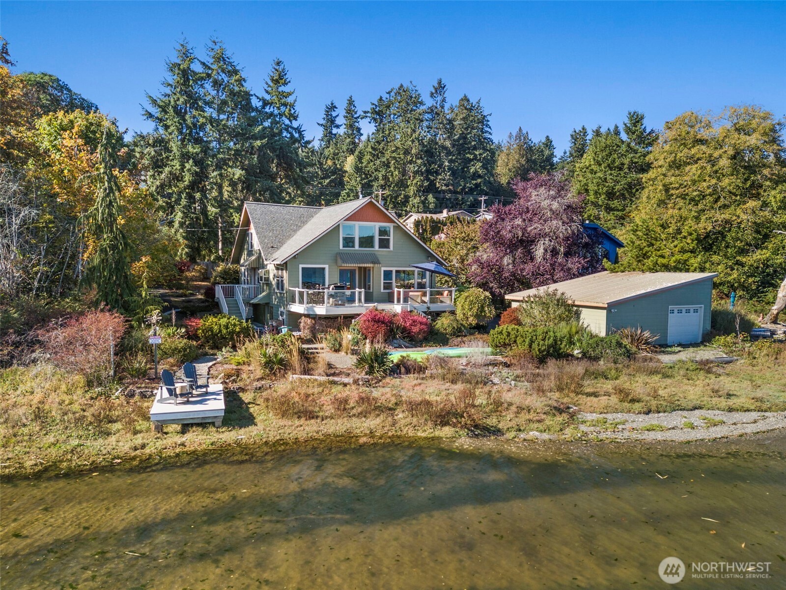 5208 Illahee Road Northeast Bremerton, WA 98311 - Photo 5 of 39 a front view of a house with a yard