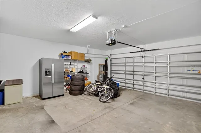 swimming pool view with a seating space