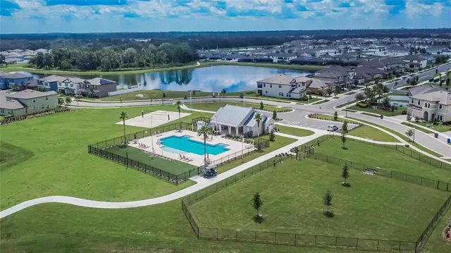 an aerial view of a house with a garden