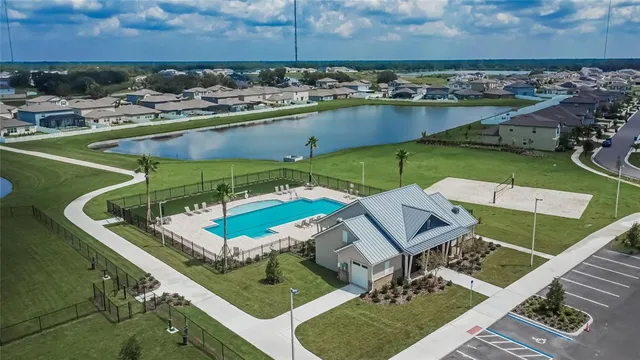 an aerial view of a house with outdoor space
