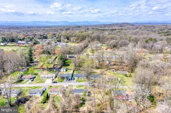 a view of city with lots of trees