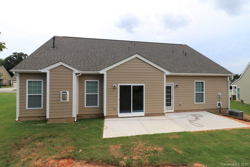 156 Hawks Creek Parkway, Unit 16 Fort Mill, SC 29708 - Photo 2 of 21 a view of a house with a yard