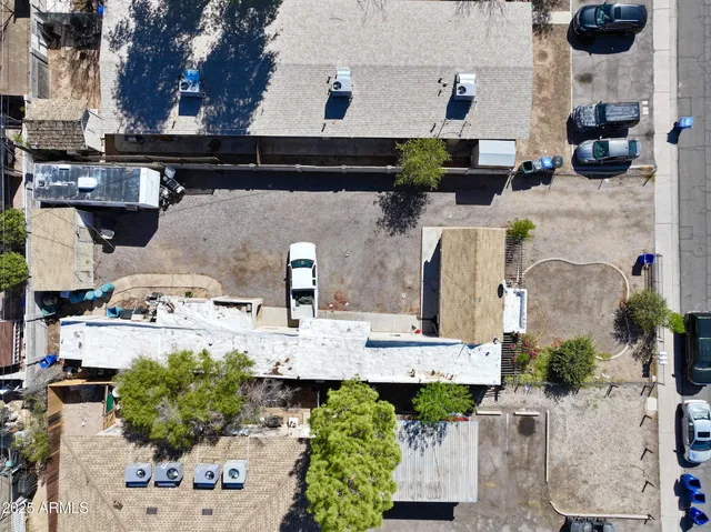 a picture of a house with outdoor seating