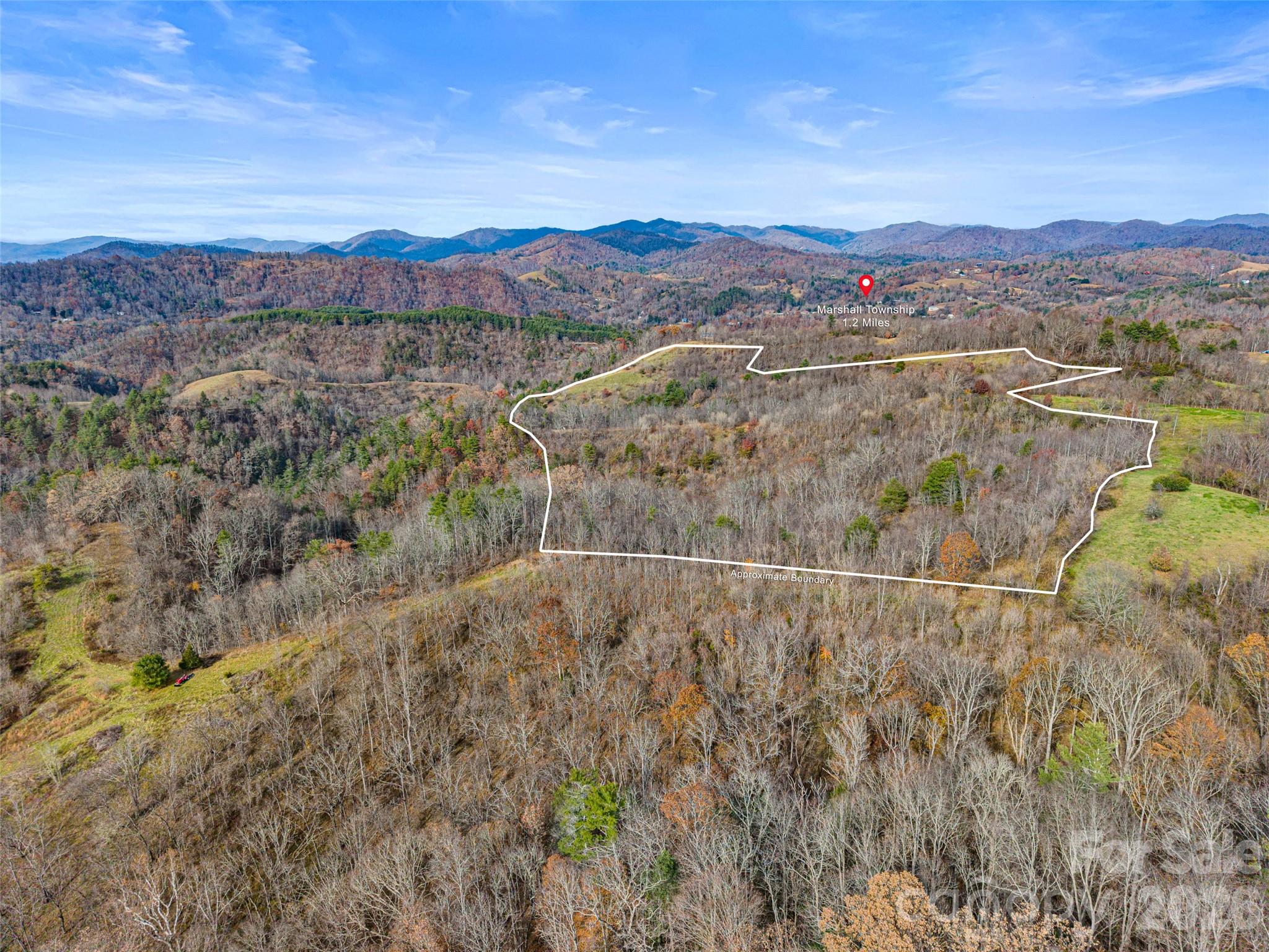 1231 Baileys Branch Road, Unit 3 Marshall, NC 28753 - Photo 10 of 36 a view of a city with mountains in the background