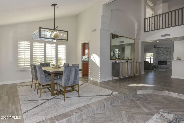 a view of backyard with outdoor seating and green space