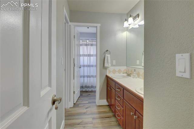 9947 Rockingham Drive Peyton, CO 80831 - Photo 22 of 43 2nd main level full bath