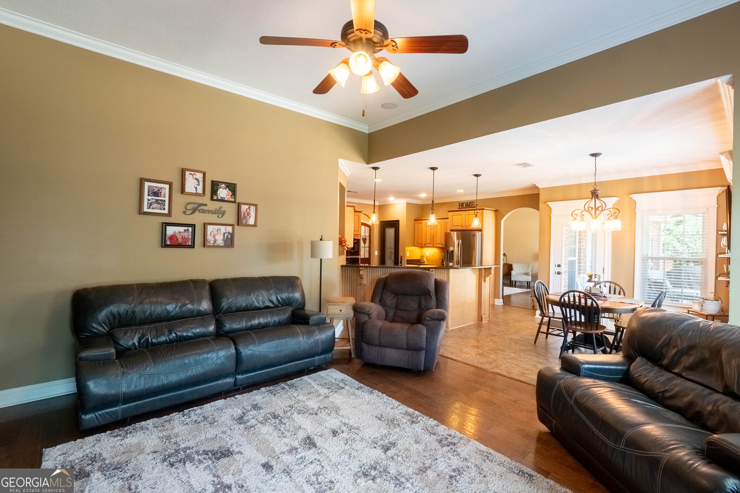 501 Old Bridge Road Warner Robins, GA 31088 - Photo 19 of 54 a living room with furniture ceiling fan and a rug