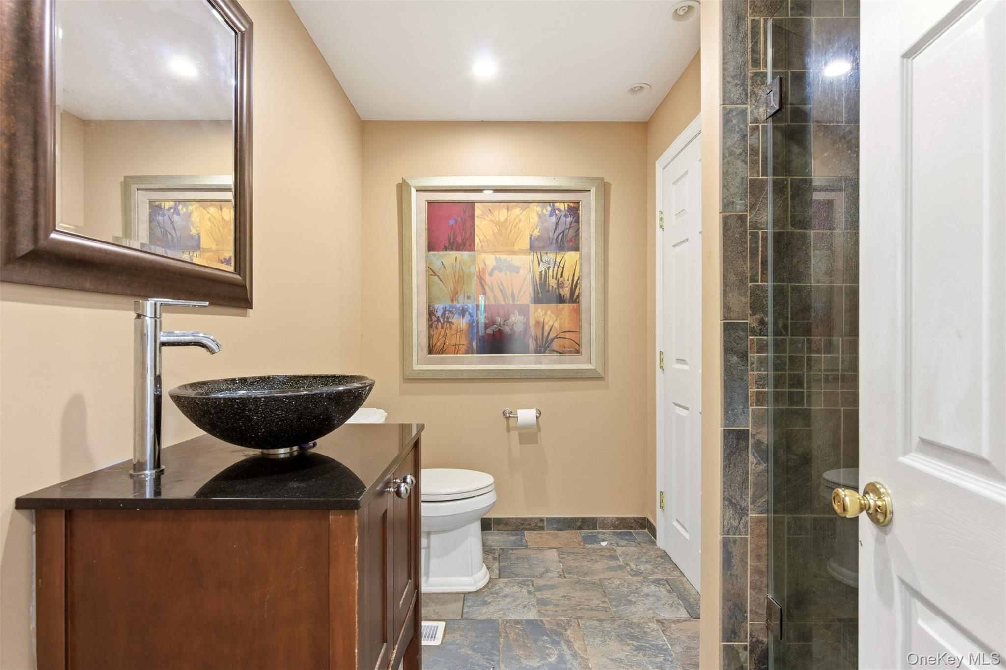 106 Vineyard Road Huntington, NY 11743 - Photo 8 of 25 a view of a bathroom with a bathtub and a shower