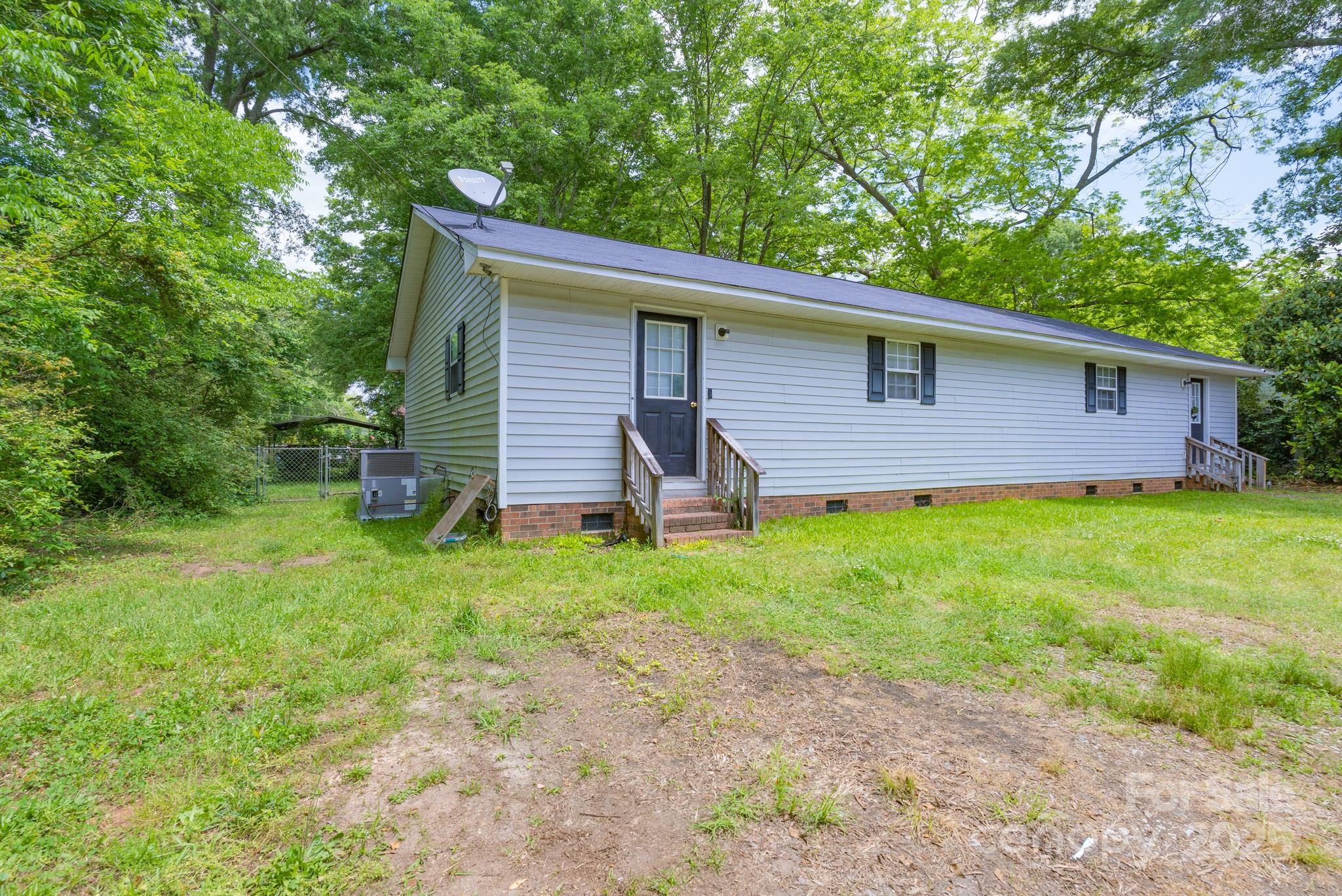 5624 Pleasant Avenue, Unit 3 Fort Lawn, SC 29714 - Photo 1 of 24 a backyard of a house with seating space