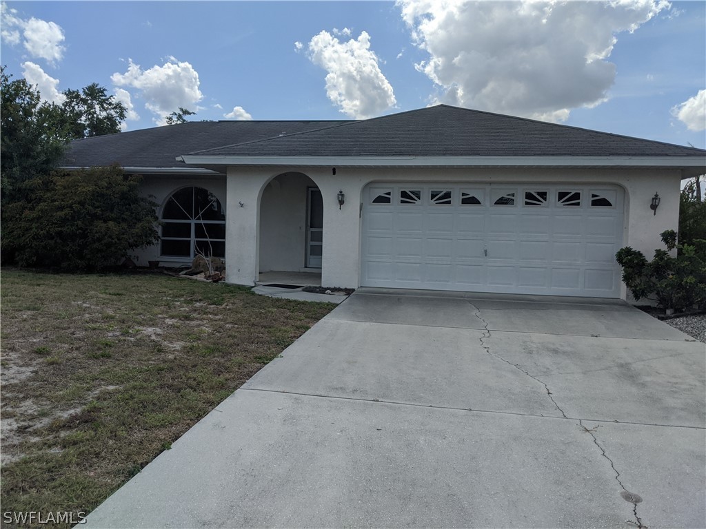 17496 Fuchsia Road Fort Myers, FL 33967 - Photo 9 of 9 a front view of a house