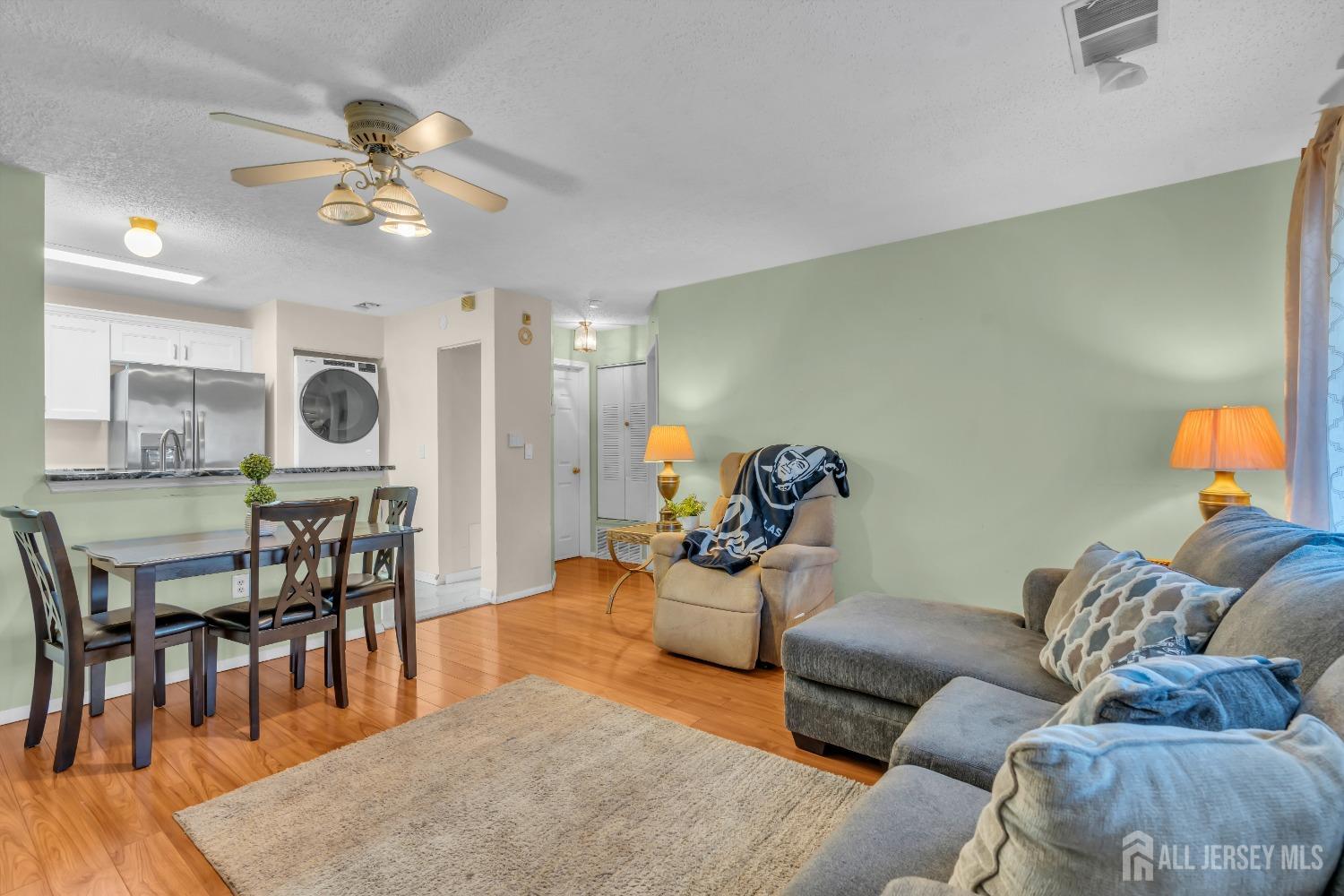1014 Edpas Road New Brunswick, NJ 08901 - Photo 3 of 27 a living room with furniture and wooden floor