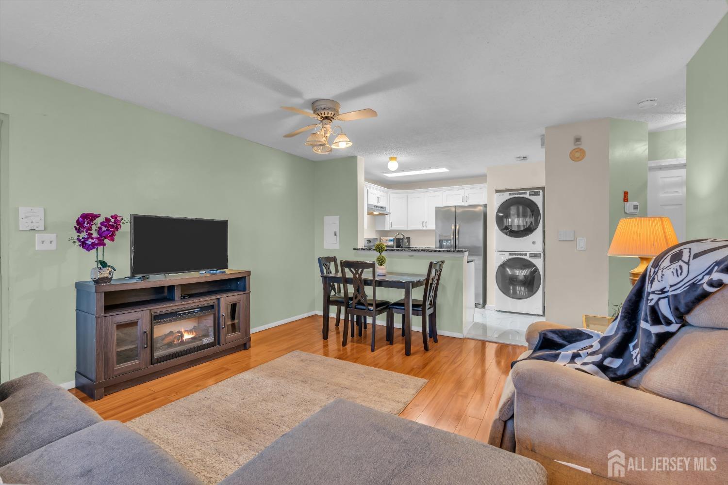 1014 Edpas Road New Brunswick, NJ 08901 - Photo 4 of 27 a living room with furniture and a flat screen tv