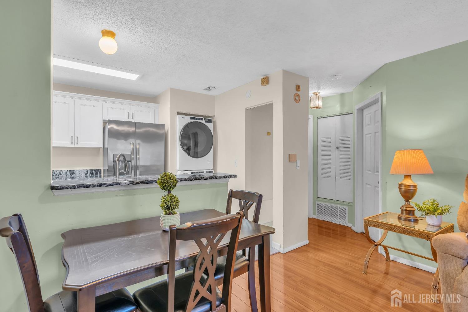 1014 Edpas Road New Brunswick, NJ 08901 - Photo 8 of 27 a living room with furniture and a clock