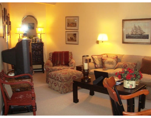 63 Garden Road, Unit G5 Wellesley, MA 02481 - Photo 13 of 19 a living room with furniture and wooden floor