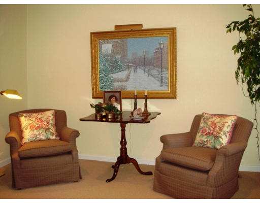 63 Garden Road, Unit G5 Wellesley, MA 02481 - Photo 17 of 19 a living room with furniture and a window