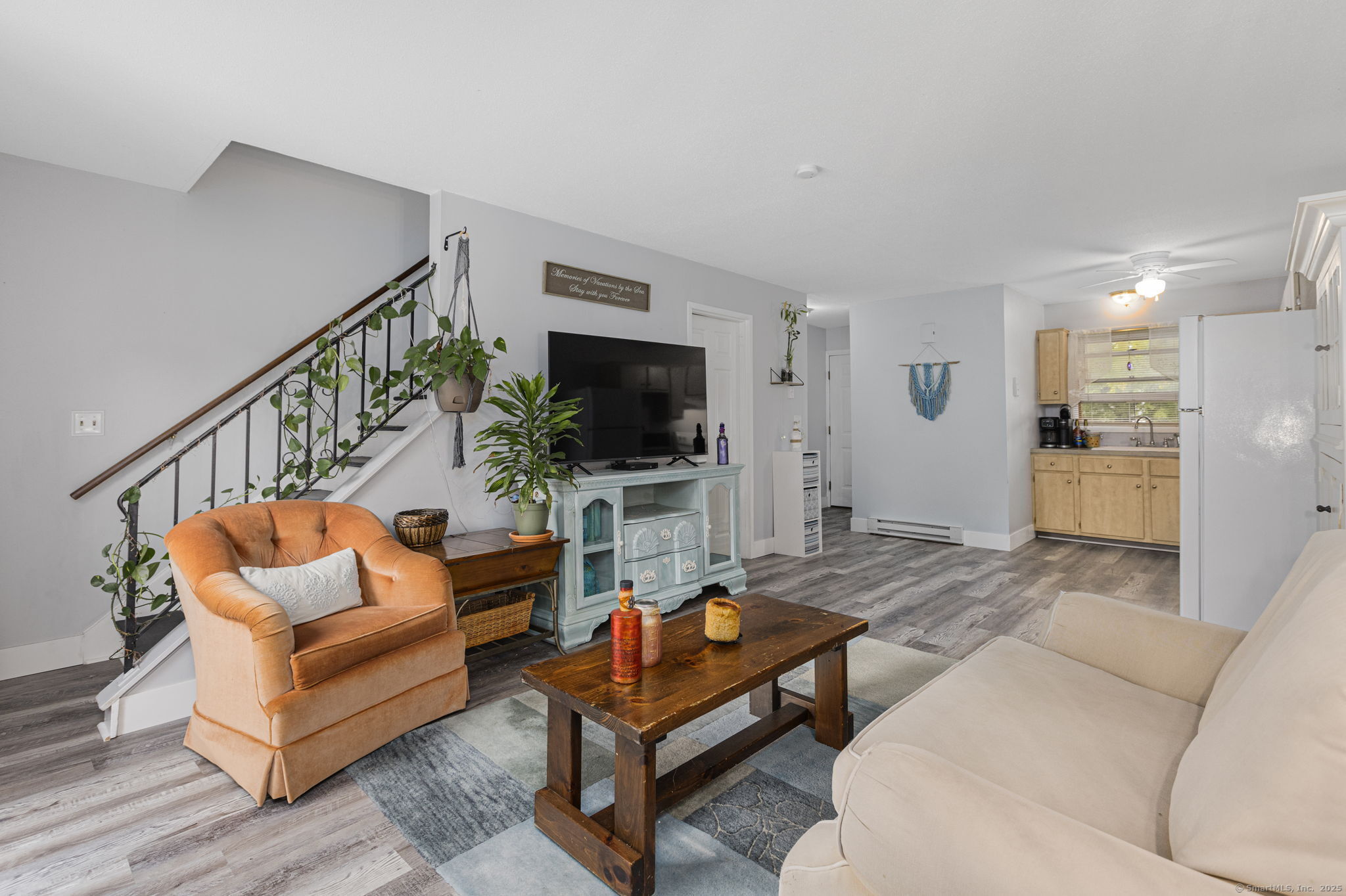 48 Athol Street, Unit 48 Killingly, CT 06239 - Photo 1 of 23 a living room with furniture and a flat screen tv