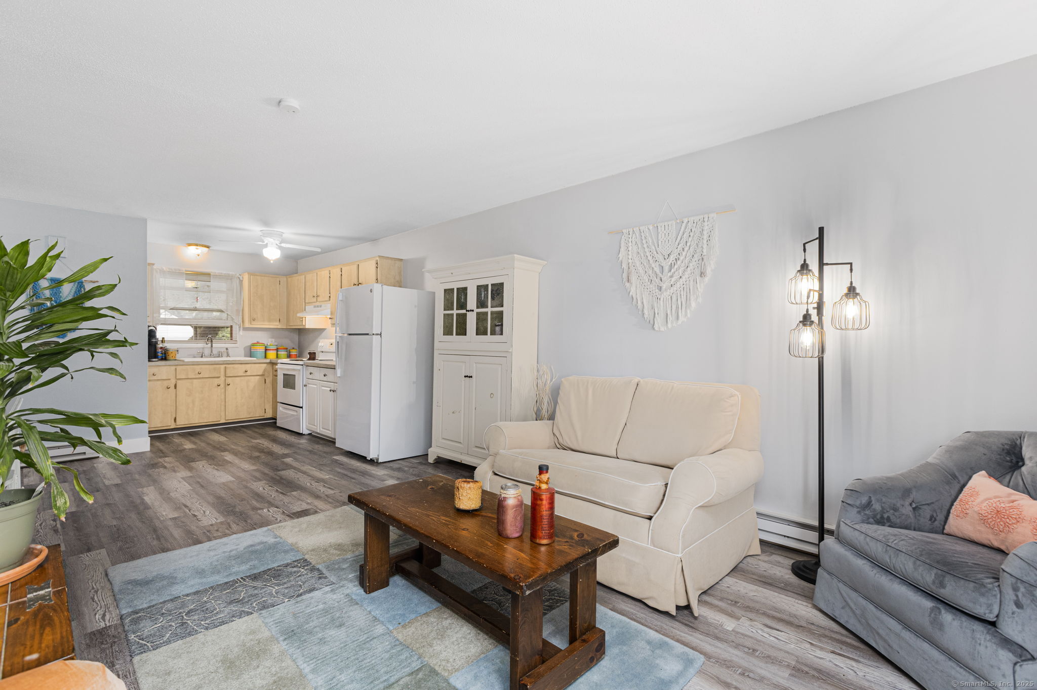 48 Athol Street, Unit 48 Killingly, CT 06239 - Photo 7 of 23 a living room with furniture and kitchen view