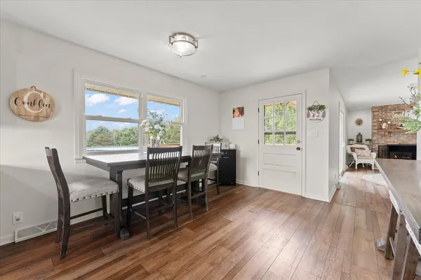 a bed room with furniture and a chair
