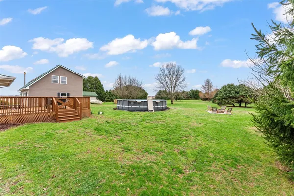 a view of a lake with a big yard