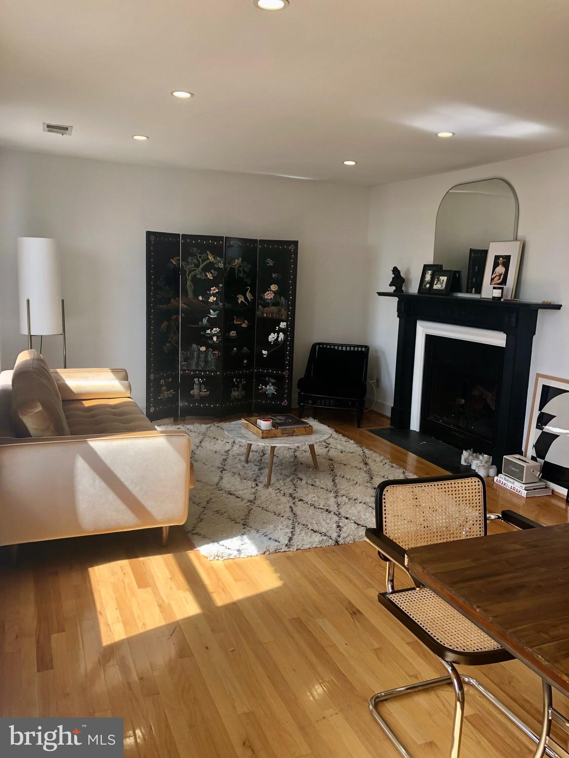 2901 16th Street Northwest, Unit 504 Washington, DC 20009 - Photo 2 of 22 Living room with fireplace