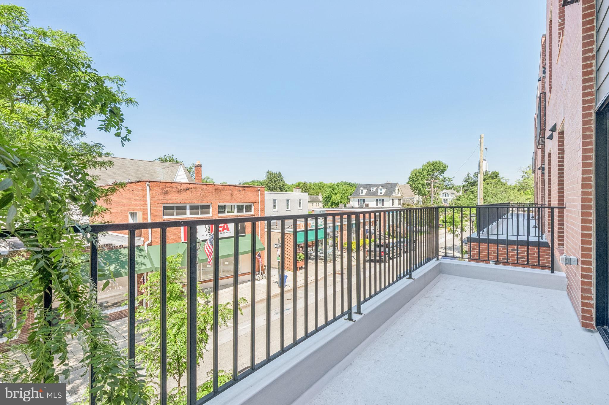 203 Haverford Avenue, Unit 208 Narberth, PA 19072 - Photo 17 of 35 a view of a balcony with city view