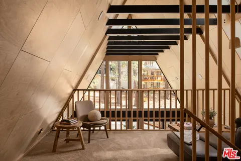 a view of entryway and hall with dining room