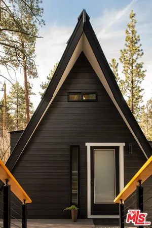 a view of furniture and window in a room