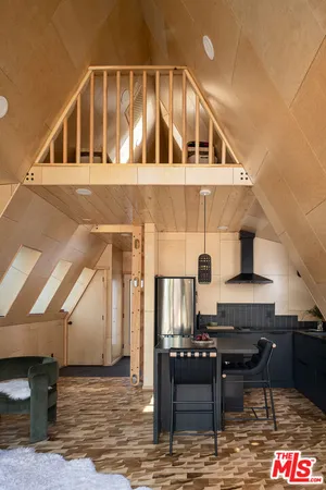 a view of staircase with wooden floor