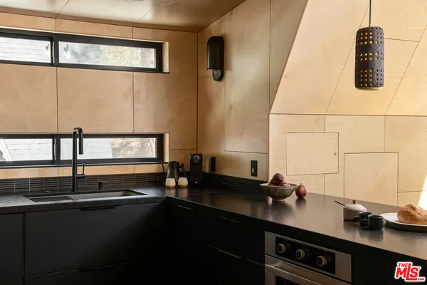 a room with a table and chairs