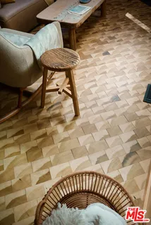 a view of a patio with table and chairs