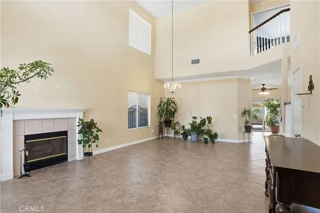 a view of a livingroom with furniture and a fireplace