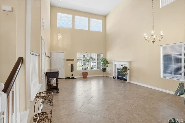 a view of a livingroom with furniture and windows