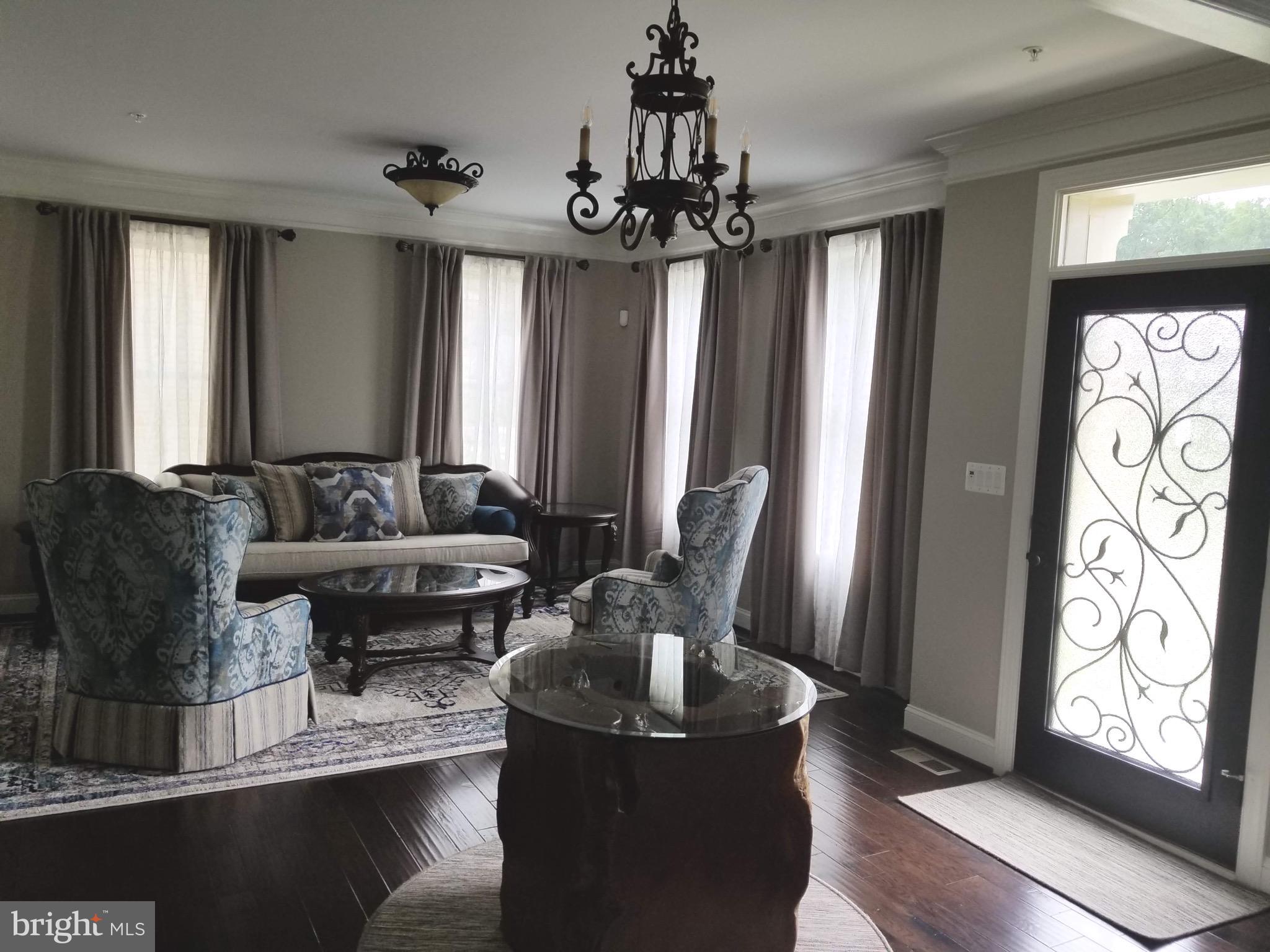 13200 Redspire Drive Silver Spring, MD 20906 - Photo 3 of 28 Living Room and Entry Foyer