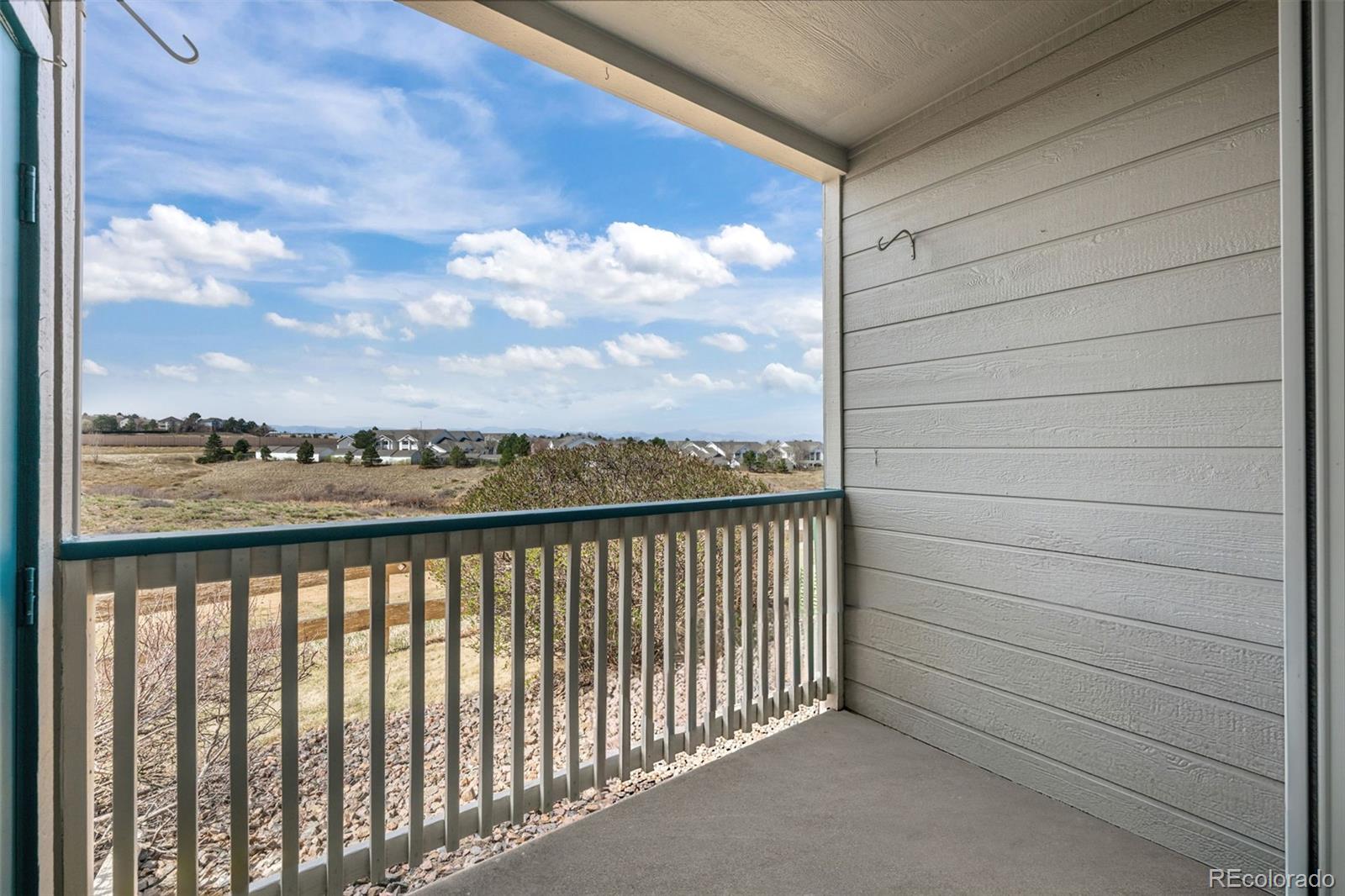 8389 Pebble Creek Way, Unit 101 Highlands Ranch, CO 80126 - Photo 25 of 44 a view of balcony with furniture