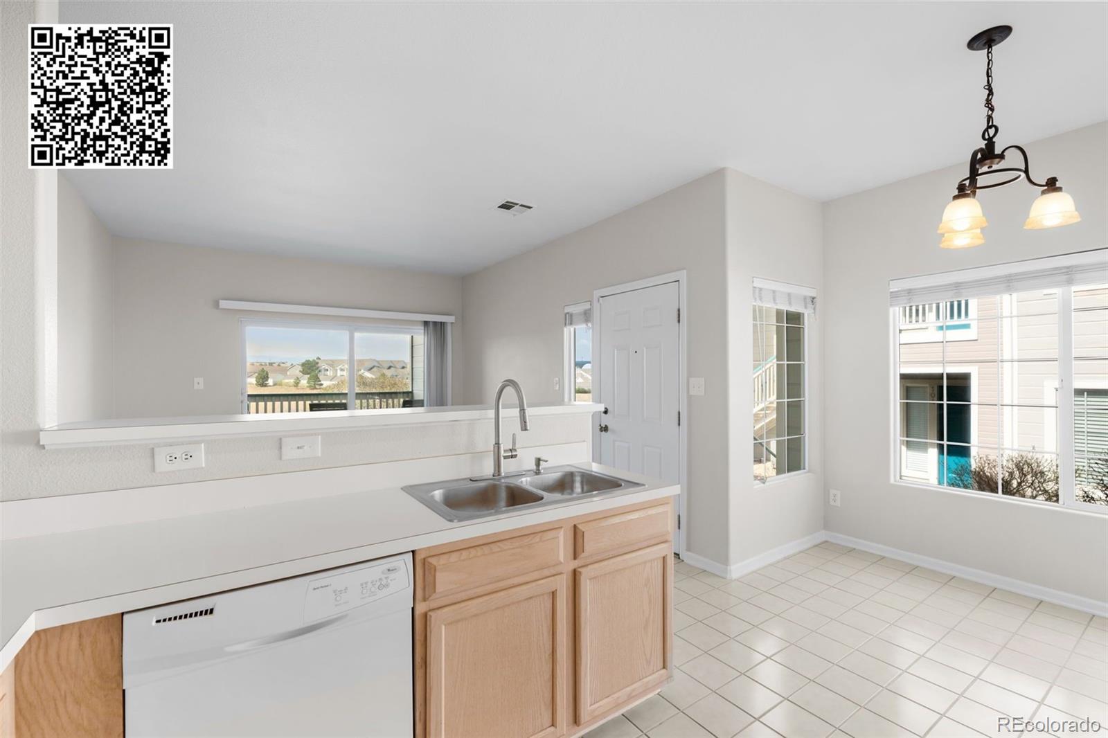 8389 Pebble Creek Way, Unit 101 Highlands Ranch, CO 80126 - Photo 8 of 44 a bathroom with a sink and a window