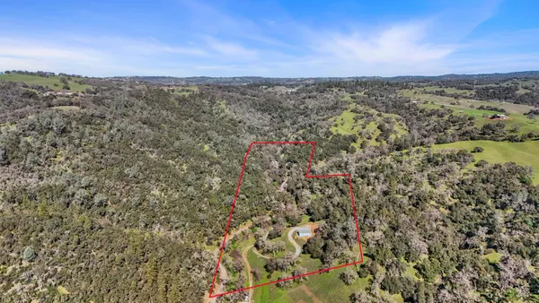a view of a kitchen with a sink
