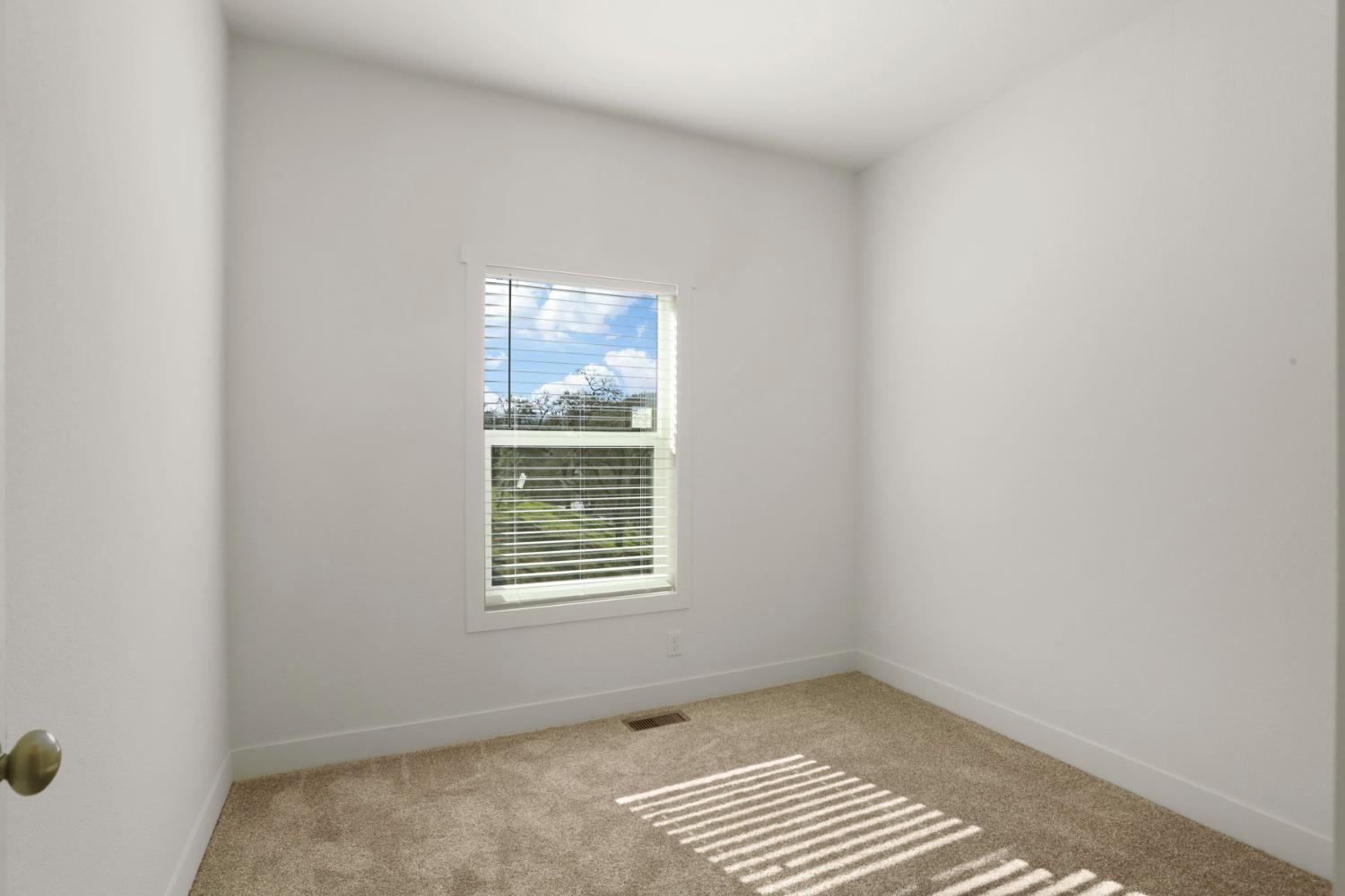 7680 Middle Bar Road Jackson, CA 95642 - Photo 30 of 58 a view of an empty room with a window