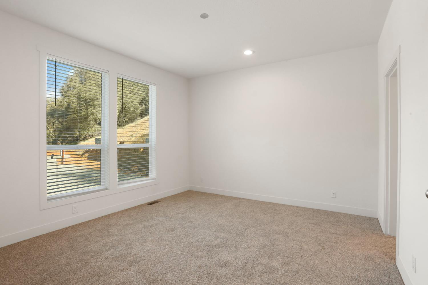 7680 Middle Bar Road Jackson, CA 95642 - Photo 35 of 58 an empty room with a window