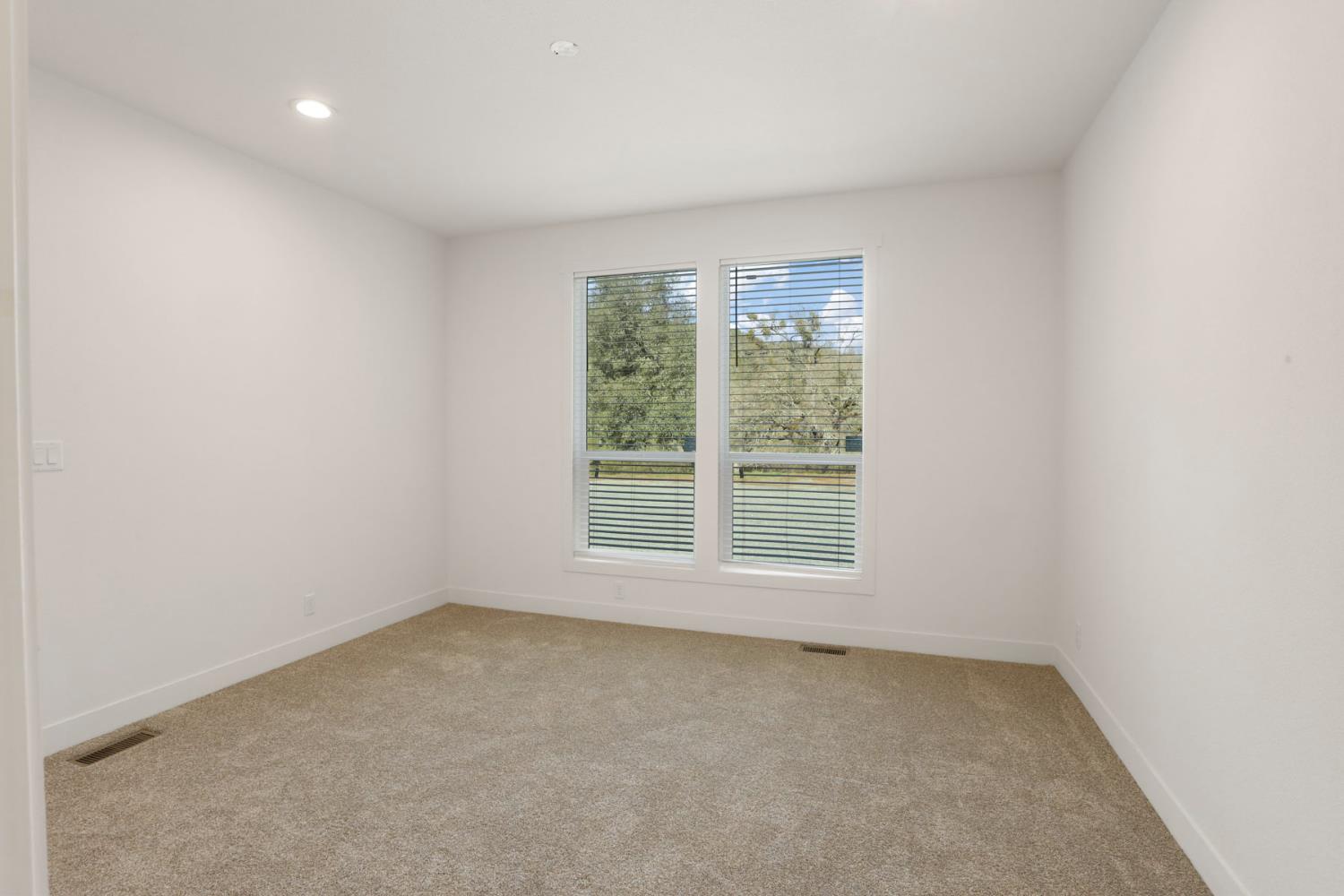 7680 Middle Bar Road Jackson, CA 95642 - Photo 36 of 58 an empty room with a window