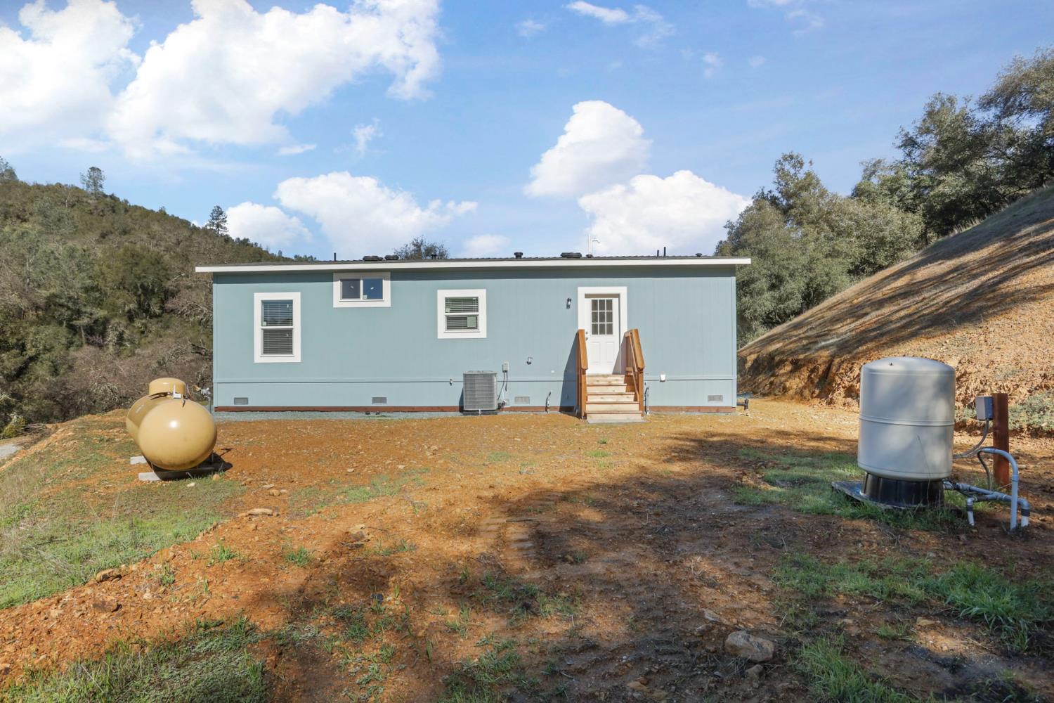 7680 Middle Bar Road Jackson, CA 95642 - Photo 43 of 58 a house view with a backyard space