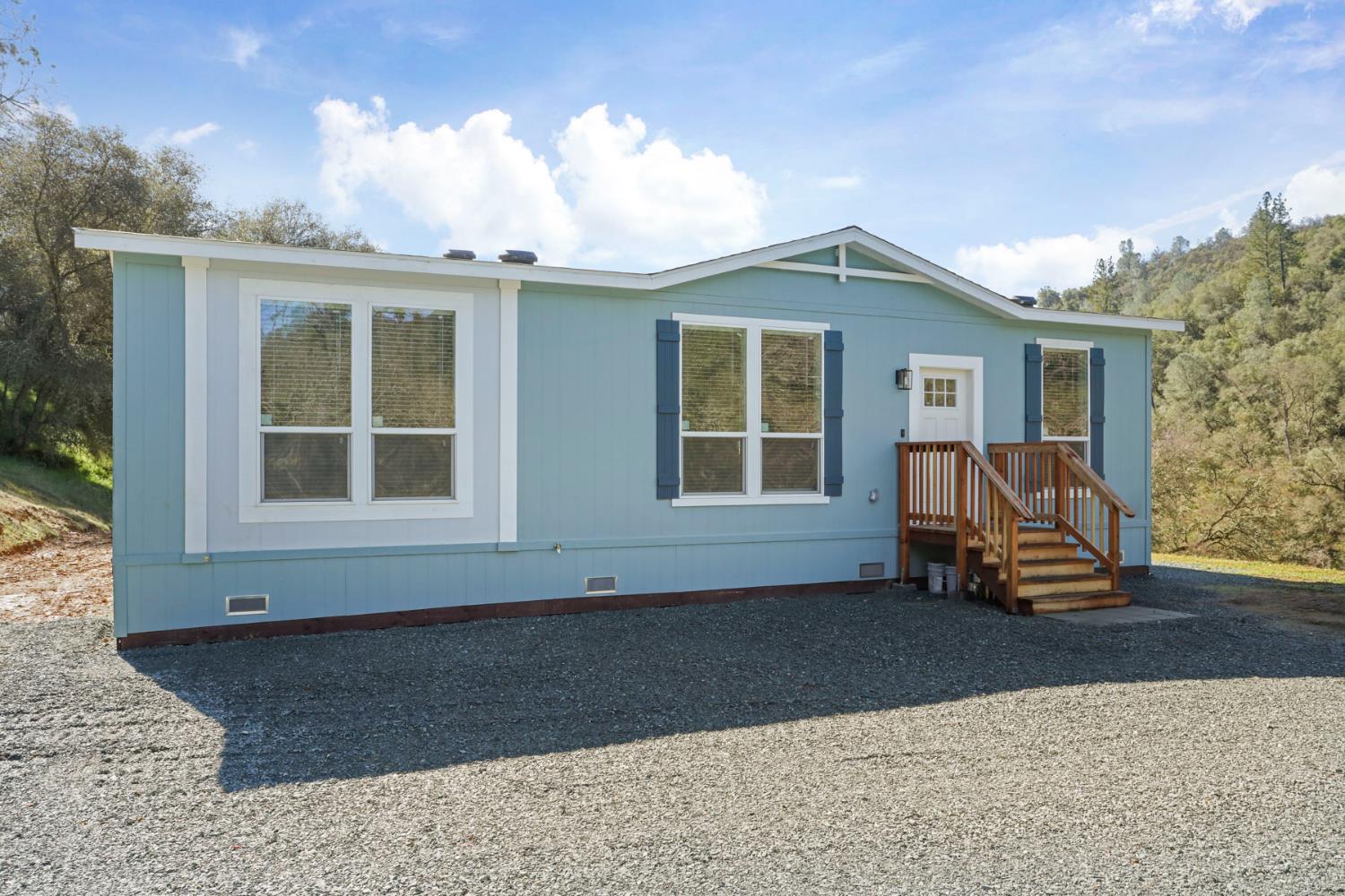 7680 Middle Bar Road Jackson, CA 95642 - Photo 48 of 58 a front view of a house with a yard