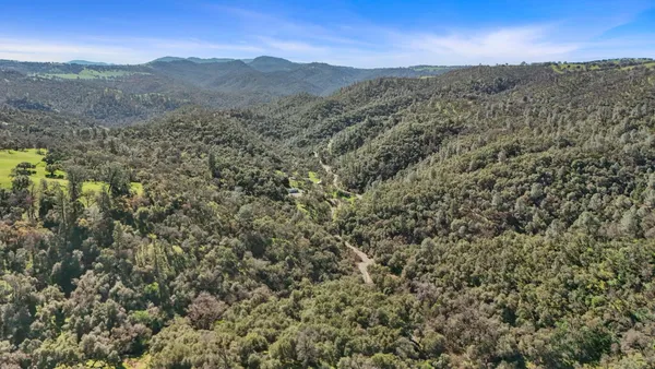 a view of lake and mountain