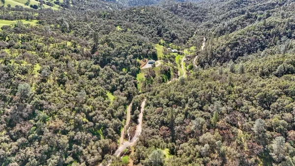 a view of a city with mountains in the background